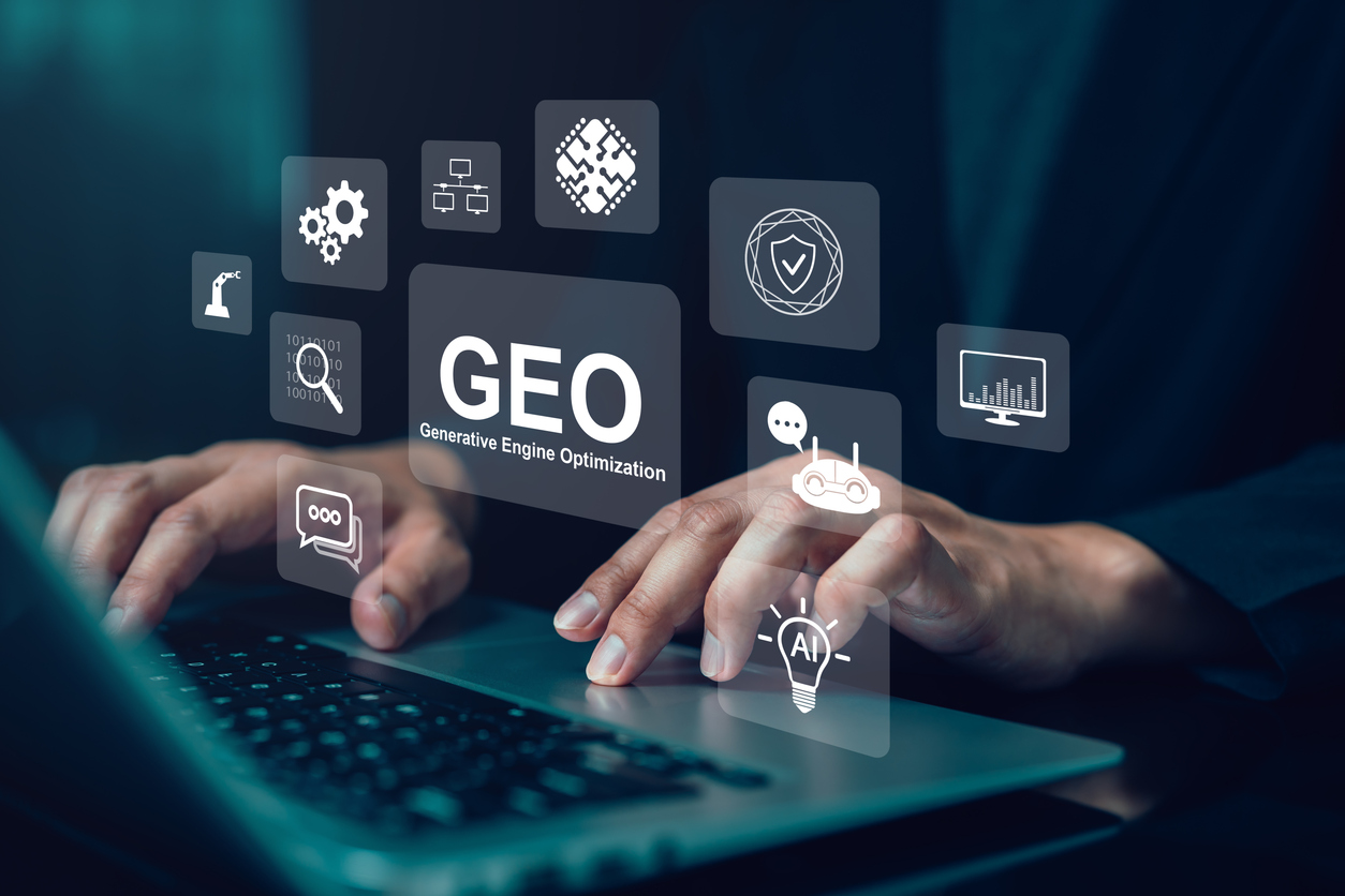 Hand use laptop with virtual GEO generative engine optimization interface and AI icon, representing digital marketing, automation, data analytics and artificial intelligence driven business technology Public Adjusting AI Optimization GEO